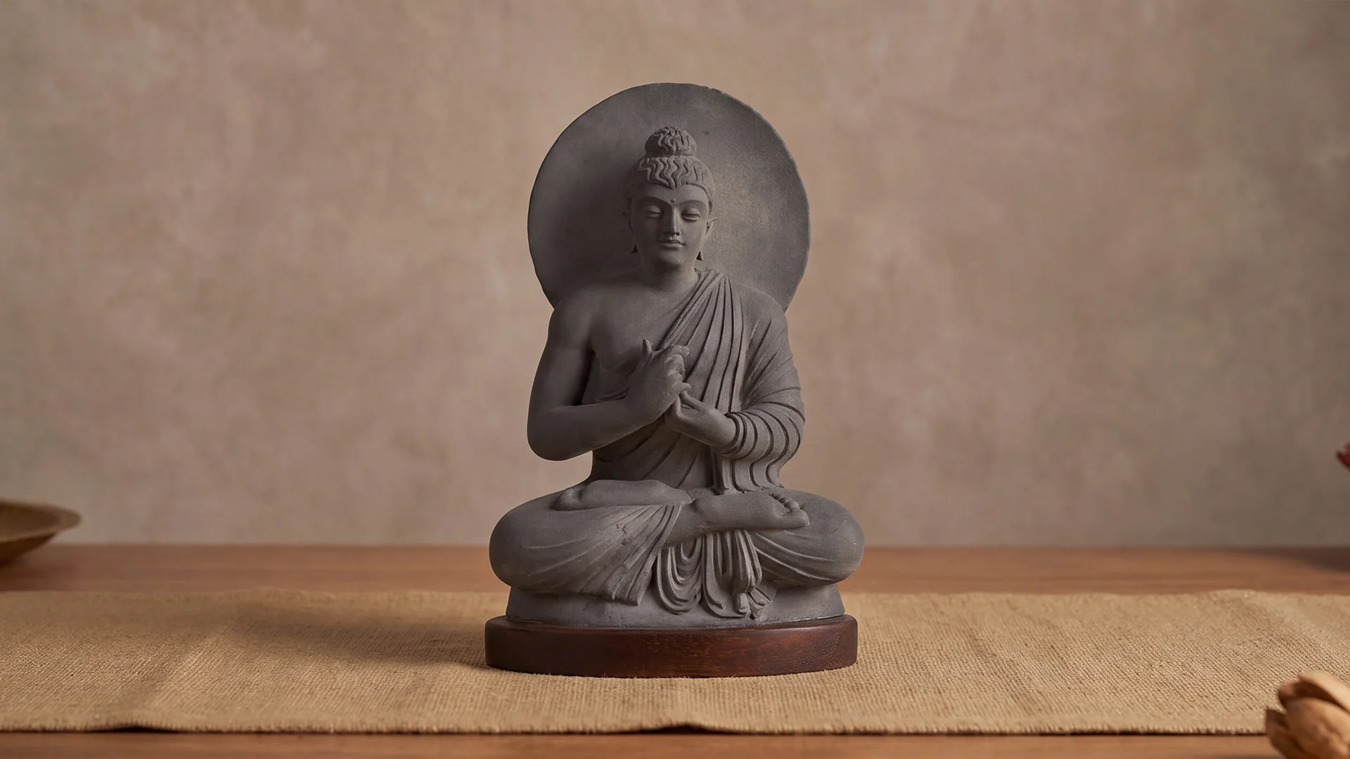 Preaching Buddha Statue in Gandhara art style, seated in Padmasana with Vyakhyana Mudra, stone composite museum replica